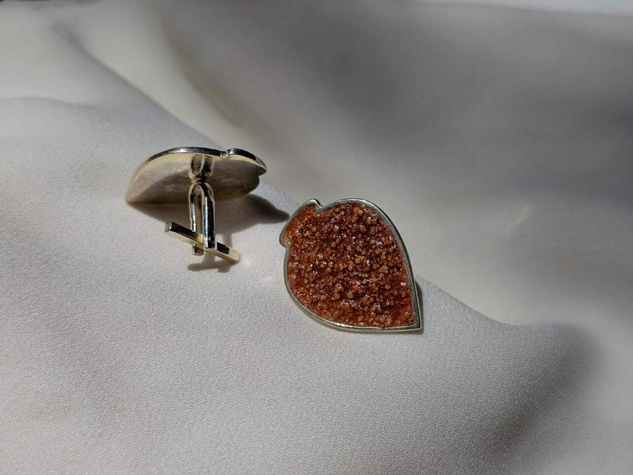 The author's cufflinks "Kvevri"